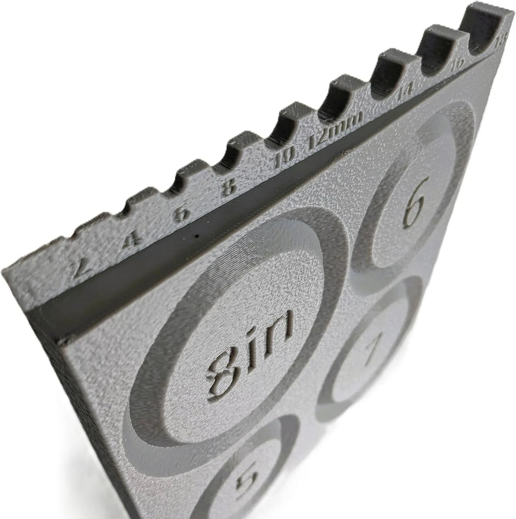 Close-up of the AKBB2 built-in bead gauge and engraved millimeter markings