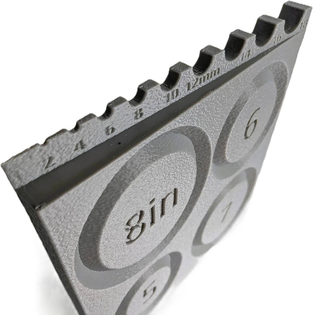 Close-up of the AKBB2 built-in bead gauge and engraved millimeter markings